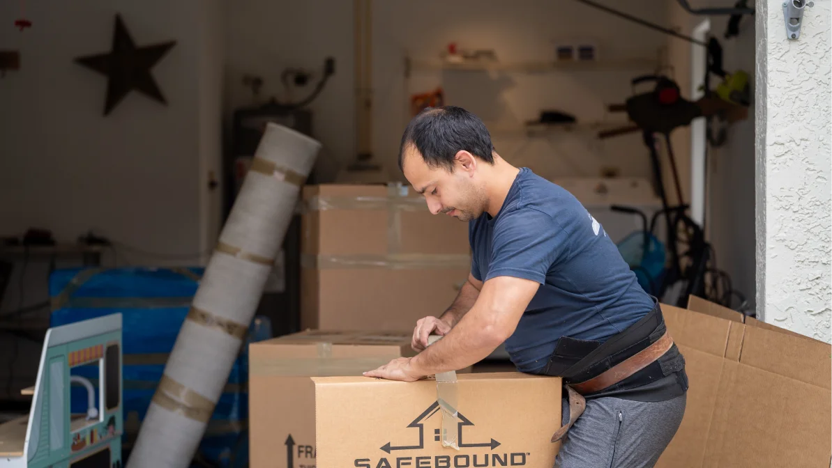 Safebound mover packing things using the safebound box